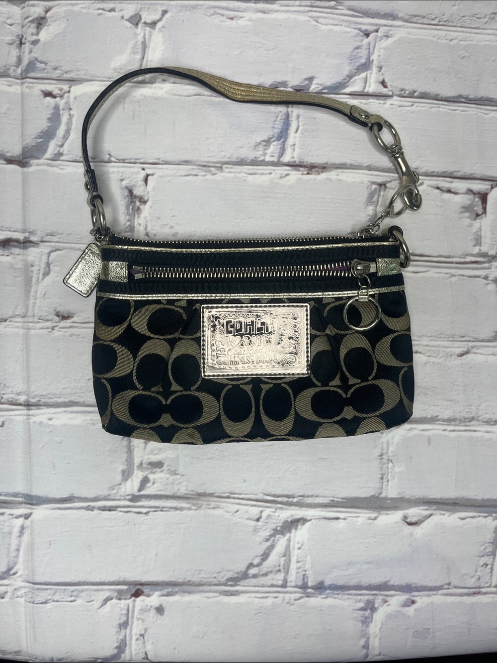 Coach Black and Tan Signature Canvas Wristlet with Gold Trim